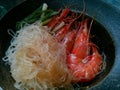 Casseroled prawns or shrimps with glass noodles