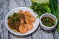 Casseroled shrimps with glass noodles eaten with seafood sauce. Royalty Free Stock Photo
