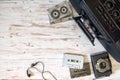 Cassette player, cassette recorder and audio tape on a wooden ba Royalty Free Stock Photo