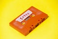 Cassette tape orange on yellow 1980s