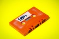 Cassette tape orange on yellow 1990s