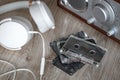 Cassette tapes, music player with white headphones. Retro style Royalty Free Stock Photo