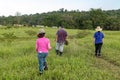 Cassilandia, Mato Grosso do Sul, Brazil - 02 28 2023: People trekking to a waterfall