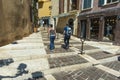 Cassis street steps shops people