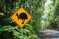 Cassowary warning sign on road, bird caution.
