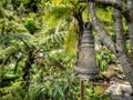 A cast-iron bell in the garden