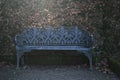 Cast iron bench in formal garden Royalty Free Stock Photo