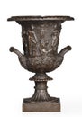 Cast iron bronzed old garden urn isolated on white Royalty Free Stock Photo