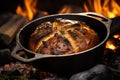 cast iron dutch oven with artisanal bread inside