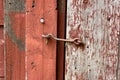 Cast Iron Hook and Eye Lock on Old Barn Door Royalty Free Stock Photo