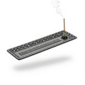 A cast iron incense holder tray Royalty Free Stock Photo