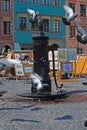 Cast Iron manual hand-powered water pump for Drinking at European old town square Royalty Free Stock Photo