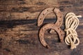 Cast iron metal horseshoes and rope Royalty Free Stock Photo