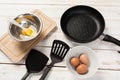 Cast iron pan and other kitchen utensils Royalty Free Stock Photo