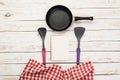 Cast iron pan and other kitchen utensils Royalty Free Stock Photo