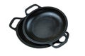 Cast iron pans. Kitchenwares isolated on white background. Rustic cookware. Top view. Royalty Free Stock Photo