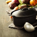 Cast iron pot and vegetables Royalty Free Stock Photo