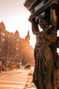 Cast iron public fountain with caryatid female figures in Barcelona