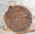 The Cast iron Rusty Sewer hatch