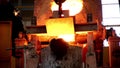 Cast iron smelting. Cast iron. Workers pour the melted cast iron in a spatially form.