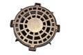 Cast iron storm sewer manhole on a white isolated background. Manhole cover for a sewer well. Wastewater disposal Royalty Free Stock Photo