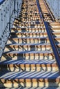 Cast iron wrought iron stairs in the city park Royalty Free Stock Photo