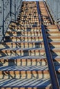 Cast iron wrought iron stairs in the city park Royalty Free Stock Photo