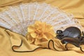 Castanets, yellow rose and white fan lying closeup Royalty Free Stock Photo