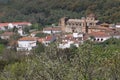 View of the houses and the unfinished church of Castano del Robledo, magical town of Andalusia. Huelva, Spain