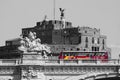 Castle SantAngelo and bridge. Black white with red bus. Rome, Italy