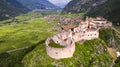 Castel Beseno aerial drone panoramic view - Most famous and impressive historical medieval castles of Italy in Trento Royalty Free Stock Photo