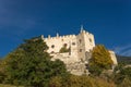 Castel Coira. Castle on the hill landscape.