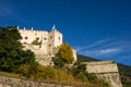 Castel Coira. Castle on the hill landscape.