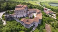 Castel Pietra surrounded by vineyards, aerial drone view - charming medieval castles of Italy in Trento province