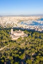 Castell de Bellver castle with Palma de Mallorca and harbor travel traveling holidays vacation aerial photo portrait format in Royalty Free Stock Photo