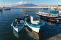 Castellammare di Stabia, Naples, Italy - fishermen boats in the port, on background Vesuvius Royalty Free Stock Photo