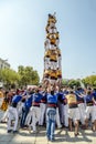 Castellers do a Castell or Human Tower, typical in Catalonia.