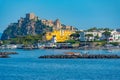 Castello Aragonese behind hotels of Italian island Ischia