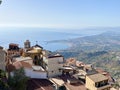 Castelmola, Italy views overlooking roof tops and the Ionian Sea