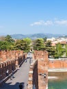 Castelvecchio Bridge with tourists in Verona Royalty Free Stock Photo