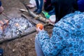 Caster on a hike, a picnic by the fire. and the sticks are fried by a marshmallows