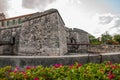 Castillo de la Real Fuerza. The old fortress Castle of the Royal Force and flower bed with red colors. Havana, Cuba. Royalty Free Stock Photo