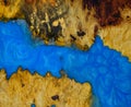 Casting epoxy resin panel with Afzelia burl wood Royalty Free Stock Photo