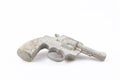 Casting of old metal hand firearm. Colt of tin separated on white background. Royalty Free Stock Photo