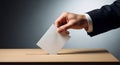 and casting vote into ballot box. Election and democracy concept with copy space Royalty Free Stock Photo