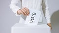 Casting vote into the ballot box Royalty Free Stock Photo