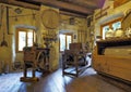 CASTIONE, BERGAMO - August 17, 2018: Inside ancient water mill with many objects and historical tools