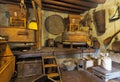 CASTIONE, BERGAMO - August 17, 2018: Inside ancient water mill with many objects and historical tools
