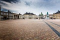 Castle Amalienborg with statue of Frederick V in Copenhagen, Denmark. The castle is the winter home of the Danish royal family Royalty Free Stock Photo