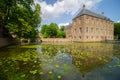 Castle Arcen with reflection on surrounding water